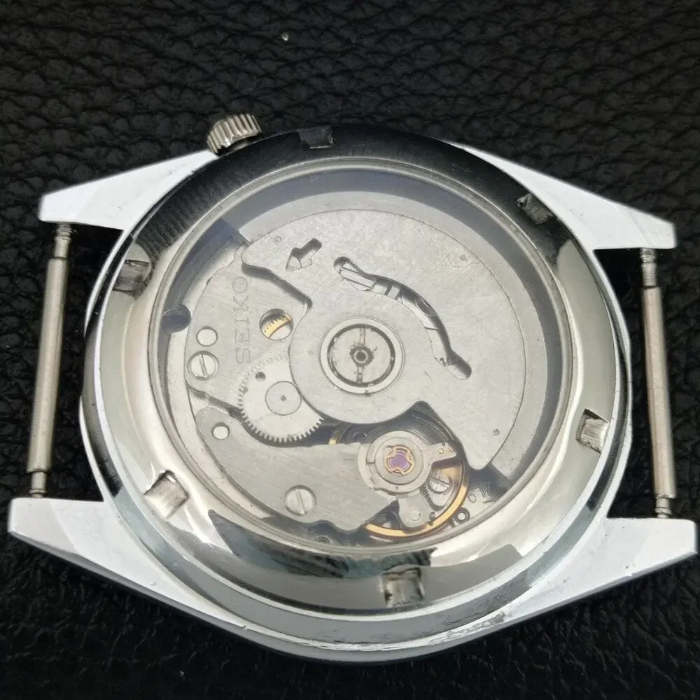 Vintage 1981 Seiko Automatic Mens Silver Watch W/daydate & White accents